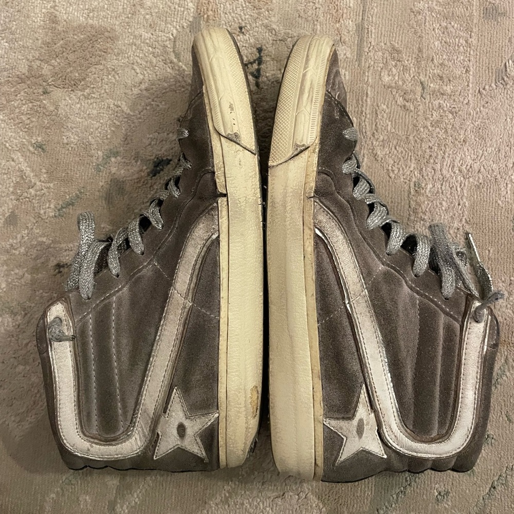 Gray and white Golden Goose women’s slides